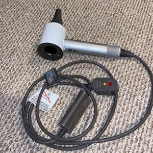 White Dyson blow dryer